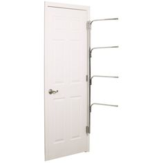 a white door with two hooks on the front and one in the back that is open