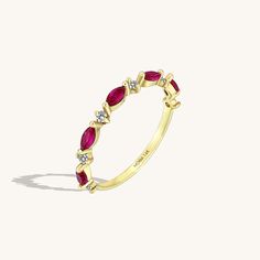 Discover this lovely Ruby Marquise Band Ring to add a right amount of color and sparkle to your look. Created with 14k solid gold and marquise cut ruby colored stones. Marquise Band, Luxury Jewelry Brands, Solid Gold Band, Colored Stones, Ruby Jewelry, Gold Decor, Dream Ring, Marquise Cut, Gold Band