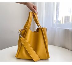 Brand Name: MR.YLLSShape: BucketHandbags Type: Shoulder BagsTypes of bags: Shoulder HandbagsOrigin: CN(Origin)Main Material: PUClosure Type: HaspHardness: SOFTExterior: NONEStyle: CasualLining Material: Synthetic LeatherOccasion: VersatileGender: WOMENPattern Type: SolidNumber of Handles/Straps: SingleInterior: No PocketDecoration: NONEItem Type: HandbagsColor: black,gray,white,yellow,apricotbag 1: women's bag 2020bag 2: shoulder bag for women 2020bag 3: casual large capacity tote bagbag 4: bask Big Bucket, Vintage Bucket, Bucket Handbags, Luxury Crossbody, Handbags Designer, Bags Luxury, Online Shopping For Women, Types Of Bag, Casual Bags