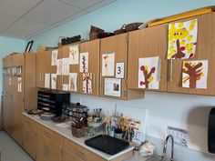 the kitchen is clean and ready to be used for art work or crafts on the wall