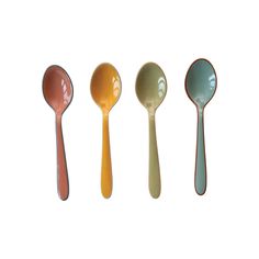 three spoons are lined up in different colors