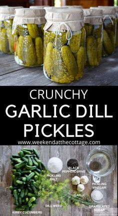 jars filled with pickles sitting on top of a wooden table