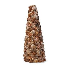 a tall christmas tree made out of pine cones