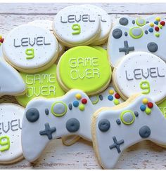 cookies decorated like video game controllers with the words level 9 on them