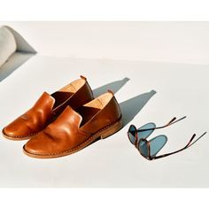 Super-comfortable slip-on shoes, handcrafted in a 6th-generation Italian workshop Leather Sole Slip-ons With Flat Heel For Galas, Leather Sole Slip-on Loafers For Galas, Everyday Slip-on Loafers With Removable Insole, Plain Toe Slip-ons With Leather Sole For Galas, Classic Brown Summer Loafers, Modern Slip-on Moccasins With Leather Lining, Spring Gala Moccasins With Leather Sole, Slip-ons With Branded Insole For Galas, Classic Closed Toe Slip-ons For Everyday