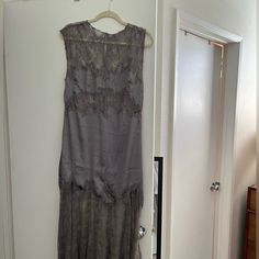 Anthropologie Brand Sleeveless Dress In Size Medium. Grey Satin With Lace. New With Tags. Elegant Sheer Sleeveless Slip Dress, Sleeveless Evening Maxi Dress With Lace Trim, Sleeveless Lace Trim Maxi Dress For Evening, Chic Sleeveless Sheer Lace Dress, Sleeveless Silk Dress With Lace Trim, Chic Sheer Sleeveless Lace Dress, Elegant Sheer Sleeveless Lace Dress, Sleeveless Sheer Lace Midi Dress, Sheer Lace Sleeveless Midi Dress