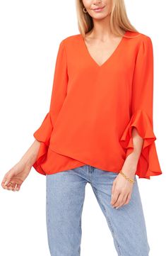 A breezy tulip-front tunic with a flattering V-neck is framed by cascading flutter sleeves for a light and romantic look. 24" front length, 28" back length (size medium) 100% polyester Machine wash, tumble dry Imported Chic Flowy V-neck Blouse, Billowy Feminine V-neck Top, Flowy V-neck Spring Blouse, Billowy V-neck Spring Tops, Chic Flowy Blouse With Flutter Sleeves, Flowy Flutter Sleeve Blouse For Fall, Chic Drapey Blouse For Spring, Blue Ruffle Top, Tunics Online