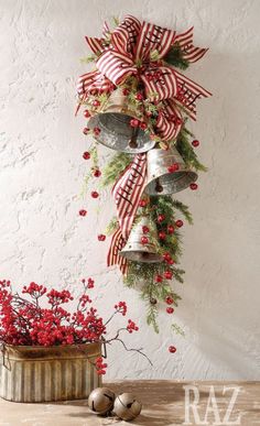 a christmas card with bells and flowers on it