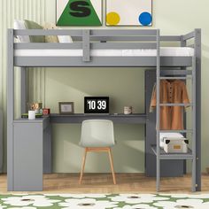 there is a bunk bed with a desk underneath it