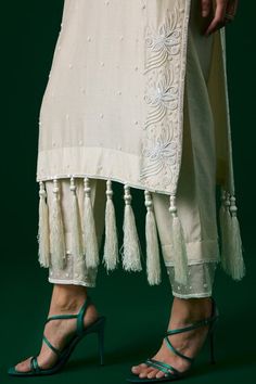 White chanderi silk kurta with all floral over crystal hand embroidery work and tassels on the hem. Paired with a matching pant and an embroidered dupatta. - Aza Fashions Elegant Spring Kurta With Dori Work, Elegant Spring Sets With Gota Work, Embroidered Cotton Silk Traditional Wear For Summer, Summer Embroidered Cotton Silk Traditional Wear, Elegant Sets With Dori Work For Spring, White Sets With Gota Work For Spring, Traditional Dupatta For Spring Reception, White Spring Sets With Gota Work, Silk Kurta With Handwork