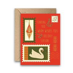 a christmas card with stamps on it and the words sending you warm wishes this holiday season