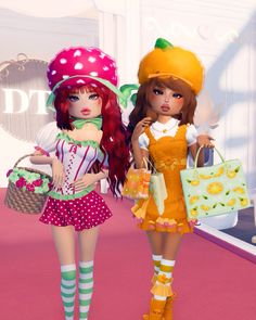 two dolls are standing next to each other holding shopping bags and purses in their hands