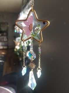 a glass star hanging from the ceiling