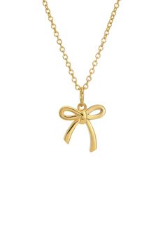 A charming, slim bow charm (12 mm) adds a touch of sweetness to this 14K gold plated brass adjustable necklace. 14K Gold plated brass. 16-18" length. Slim bow charm. Chic Adjustable Charm Necklaces As Gifts, Chic Adjustable Charm Necklaces For Gifts, Gold Necklace With Ribbon For Gift, Gold Necklace With Ribbon Perfect For Gifts, Chic Gold Necklace With Bow, Cute Necklaces Gold, Gold Bow Necklaces For Gifts, Gold Necklaces With Bow For Gifts, Gold Necklaces With Bow As Gifts