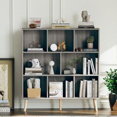 a bookshelf with many different items on it