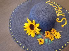 Custom painted hat includes name or short phrase, all freehand, with additional embellishments. I.e. flowers Handmade Flower Hats For Summer, Embroidered Sun Hat For Beach, Handmade Sun Hats For Spring, Handmade Straw Cap Hat For Spring, Handmade Spring Straw Cap Hat, Handmade Spring Straw Cap, E Flowers, Painted Hats, Daisy Design