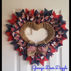 a patriotic wreath hanging on the front door