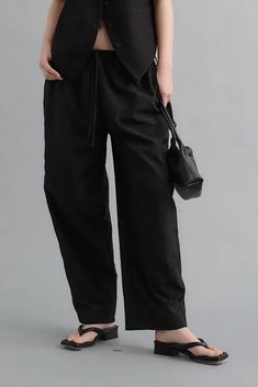 Artful Linen Drawstring Wide Leg Cargo Pants for a Relaxed Chic Look Discover the perfect blend of comfort and style with our Linen Drawstring Wide Leg Cargo Pants. Featuring a drawstring waist, these low-rise cargo pants offer a relaxed and customizable fit. The wide-leg silhouette and utility-focused design are not only fashionable but also offer plenty of room for movement. Crafted from natural linen, these pants ensure a cool and breathable experience, perfect for a laid-back summer look. St Versatile Wide-leg Pants With Tie Waist, Stretch Straight Leg Pants With Drawstring, Solid Ankle-length Drawstring Harem Pants, Solid Ankle-length Harem Pants With Drawstring, Solid Color Wide-leg Pants With Tie Waist, High-waisted Pants With Tie Waist And Relaxed Fit, Relaxed Fit High-waisted Pants With Tie Waist, Versatile Trousers With Tie Waist, Black Wide Leg Pants With Drawstring For Spring