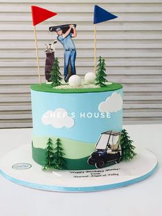 a golf themed cake on a white table