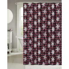 a shower curtain with snowflakes on it