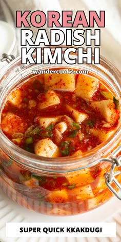 a glass jar filled with food sitting on top of a table