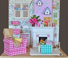 a doll house is shown with furniture and accessories in front of the fireplace, window