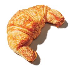 a croissant shaped like an animal on a white background