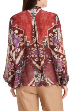 A batik-inspired print in rich hues lends bohemian flair to an airy blouse fashioned with blouson sleeves and a pintucked yoke. Band collar Long sleeves with elastic cuffs 100% polyester Dry clean Imported Pintuck Blouse, Kobi Halperin, Batik Print, Blouse Nordstrom, Batik Prints, Band Collar, Fashion Today, Pin Tucks, Blouse Styles