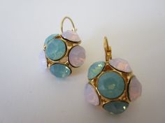 Amazing gold plated earrings placed with Swarovski Rose Water Opal and Pacific Opal Chaton rhinestone.  These stunning earrings will be the perfect completion for a glow and unforgettable look! Rose Water Opal, Glow Jewelry, Stunning Earrings, Fish Hook, Gold Plated Earrings, Handmade Earrings, Turquoise Ring, Gold Earrings, Gemstone Rings