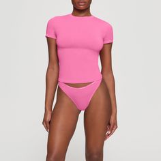 The perfect crewneck tee, this breathable, everyday classic is made with cool, comfortable stretch-cotton and finished with sporty stitching. | SKIMS T-Shirt | Pink | 2XS | Cotton Jersey Linen Pajamas, Cami Bodysuit, High Waisted Briefs, Cotton Pajama Sets, Neck Stretches, Ribbed Leggings, Triangle Bralette, Silk Shorts, Night Shirt