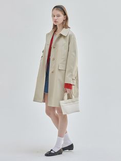 This is NILBY P’s practical half trench coat. With its convenient knee-length fit, it pairs well with various looks, whether they're formal or casual, and it's great for creating a fresh image. As a basic item, it complements any style effortlessly.- It's a great item for daily wear- You can mix and match it with different styles of outfits to create various looks- It can be easily taken off with the front buttons Cotton Trench Coat, Outfits With Beige Coat, Coat For Women Formal, Half Trench Coat Outfit, Trench Coat Spring, Ivy Style Women Preppy, Spring Beige Raincoat With Pockets, Beige Workwear Raincoat With Pockets, Wool Trench Coat Short