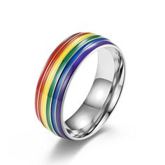 Description & Details They appear as perfect arcs, often during a rainstorm when the sun shines onto water droplets, shattering its white light into an array of brilliant colors. High quality titanium stainless steel Hypoallergenic, gold plating 8 mm wide US size 7 - 12 available Lesbian Wedding Bands, Gay Jewelry, Rainbow Flag Lgbt, Couple Band, Rainbow Ring, Rainbow Rings, Water Droplets, Womens Wedding Bands, Earring Sale