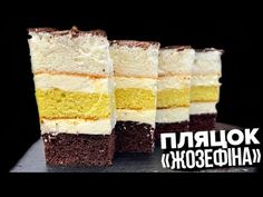 three pieces of cake sitting on top of each other in front of a black background