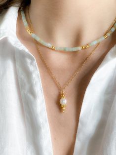 AELIA NECKLACE Aquamarine beaded necklace with gold lated details Dimensions: Total necklace length  42cm / 16.53 in + 5cm / 1.96in  extender chain Weight: 20gr DELIVERY (estimate delays) Greece: 2-5 business days via ELTA  Europe: 5-10 business days via Hellenic Post International: 10-21 business days via Hellenic Post You can shorten considerably your delivery times by upgrading to DHL Express services at checkout.  All PURE GREEK Jewels  are inspired from the ancient greek arts, folklore traditions and world cultures. Our jewelry are handmade with love and imagination so you can enjoy unique creations.   I use mineral and semi-precious stones, crystals, real pearls,  gold plated brass metal, wooden elements, greek and oriental charms, pompons and feathers. I only use high quality materi Delicate Gold Beaded Necklaces With Natural Stones, Gold Crystal Choker Necklaces With Gemstone Beads, Gold Beaded Choker With Natural Stones, Gold Choker With Gemstone Beads As Gift, Gold Choker With Gemstone Beads For Gift, Heishi Necklace, Ancient Greek Art, Aquamarine Necklace, Aquamarine Beads