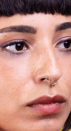 Minimalist triangle septum ring, made of sterling silver. Available also in 14k yellow/white gold and gold plated silver. This popular triangle septum is bold and beautiful, and it's inspired by the Indian nose rings and tribal shapes in a minimalist style. Can be also worn as a regular hoop earring, helix piercing or tragus. Fits men and women styles. ----------------------------------------------------- > Hand made septum ring > Available in sterling silver, 14k gold or gold plated silve Hypoallergenic Minimalist Nose Studs, Gold Septum Ring For Everyday Wear, Internally Threaded Minimalist Septum Ring, Everyday Gold Septum Ring, Septum Ring Men, Septum Piercing Triangle, Minimalist Gold Septum Ring, Septum Piercing Jewelry Indian, Bohemian Handmade Silver Septum Ring