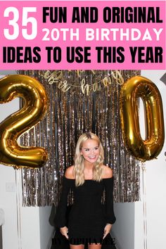 a woman standing in front of balloons and streamers with the number 20 on it