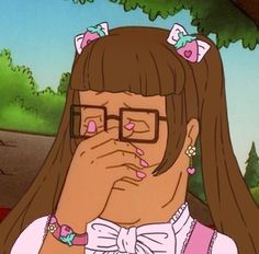 a cartoon girl with glasses covering her face