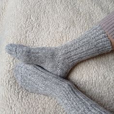 These are highest quality Italian alpaca (35%) and lamb wool (65%) winter socks. Made in Italy. These nordic socks do not contain latex, elastomer, nylon or any other kind of synthetic materials.  We also re-enforced toes and heels with extra-durable organic cotton filament. Our wool comes from mulesing - free farms and has organic certification. These warm socks are extremely comfortable and snug. Can be used as bed socks. Many of our clients have shared that they use them as boot socks and tre Cozy Soft Gray Socks, Cozy Gray Socks For Stocking Stuffers, Soft Gray Winter Socks, Comfortable Knitted Gray Socks, Casual Gray Knitted Socks, Cozy Snug Gray Socks, Cozy Gray Comfortable Socks, Comfortable Thick Socks For Stocking Stuffers, Cozy Knitted Snug Socks