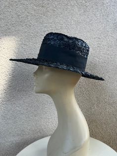 Vintage 60s Eva Mae Modes brim black cello straw grosgrain ribbon sz 21.5" Made in USA. Good condition Measurements  Interior band 21.5 Brim 3.5" Crown height 6" Width hat 14" Black Formal Boater Hat With Flat Brim, Formal Black Boater Hat With Flat Brim, Black Brimmed Boater Hat For Formal Occasions, Formal Black Boater Hat With Curved Brim, Formal Black Brimmed Boater Hat, Classic Black Boater Hat For Party, Black Brimmed Boater Hat For Evening, Black Boater Hat With Short Brim For Evening, Black Adjustable Boater Hat For Formal Occasions