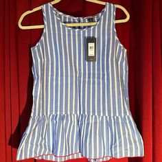 Striped Sleeveless Tommy Hilfiger Top, With Buttoned Neckline On The Back, And Red Trip Bottom. Summer Striped Tops By Tommy Hilfiger, Tommy Hilfiger Striped Tops For Summer, Striped Cotton Sleeveless Tank Top, Casual Striped Sleeveless Tank Top, Tommy Hilfiger Striped Tops For Spring, Striped Sleeveless Cotton Top, Striped Sleeveless Vest Top, Striped Sleeveless Tank Top For Vacation, Spring Striped Tank Top