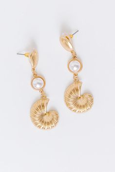 - Upgrade your style with these fabulous dangling shell earrings. The shimmering gold seashells and faux pearls cascade gracefully from the ear, adding a touch of seaside charm. - Gold colored metal material - Oval shaped studs with dangling faux pearls and seashells - Post backs - Size: 2.2 inches Gold Seashell Earrings, Gold Shell-shaped Metal Earrings, Gold Shell-shaped Pearl Earrings, Gold Pearl Shell-shaped Earrings, Gold Plated Shell-shaped Earrings, Seashell Earrings, Shell Earrings, Faux Pearl, Sea Shells