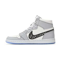 Bridging the gap between street-ready sportswear and luxury fashion, the Air Jordan 1 High is drawn from a larger collaboration that spans footwear, apparel and accessories. Designer take on the iconic sneaker makes use of a white and grey upper constructed from Italian leather with hand-painted edges. Dual branding hits take the form of a woven tongue tag, a Nike Swoosh in Oblique jacquard. Jordan Model, Jordan Air, Jordan 1 High Og, Athletic Looks, Air Jordan Sneakers, Sneaker Games, Loafer Sneakers, Air Jordan 1 High, Jordan 1 High