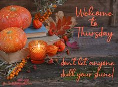 there is a candle and some pumpkins on the table next to books with words welcome to thursday don't let anyone dull your shine