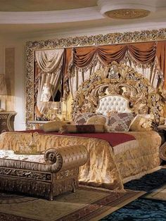 an elaborately decorated bedroom is shown in gold