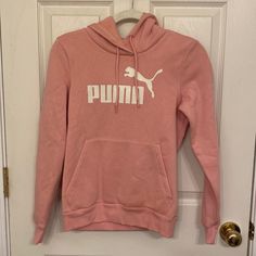 *Nwt* Puma Hoodie Size: Xs Color: Pink Condition: Nwt!! Never Worn! Casual Puma Logo Sweatshirt For Winter, Casual Long Sleeve Sweatshirt With Puma Logo, Winter Puma Logo Hooded Hoodie, Winter Hoodie With Puma Logo, Winter Sporty Puma Logo Sweatshirt, Sporty Puma Logo Sweatshirt For Winter, Puma Logo Sports Hoodie, Casual Puma Hoodie For Sports, Casual Puma Sports Hoodie