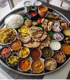 a platter filled with lots of different types of food