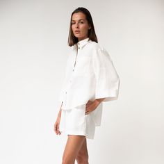 The Perfect Days Shirt is designed from breathable, high-quality, 100% heavy linen. It features a relaxed straight cut, a classic collar, and a button-down front with coconut buttons, adding a unique touch. This shirt can be styled with or without a belt for different looks. The pristine white is timeless and versatile, perfect for casual and formal occasions.  Style Tip: Wear with white heavy linen shorts for an all-white, chic look, or contrast with darker pants for a striking appearance. 100% Linen Machine Wash Up To 30ºc/86ºf Gentle Cycle Do Not Bleach Iron Up To150ºc/302ºf Do Not Tumble Dry Dry Clean Tetrachlorethylene Summer Shirt With Button Cuffs For Daywear, Modern Linen Shirt With Spread Collar, Summer Top With Button Cuffs And Lapel Collar, Summer Workwear Shirt With Relaxed Fit, White Linen Shirt With Button Cuffs, Spring Loungewear Shirt With Spread Collar, Classic Relaxed Fit Shirt For Loungewear, Oversized Lapel Collar Shirt For Summer, Unstructured Linen Tops With Lapel Collar