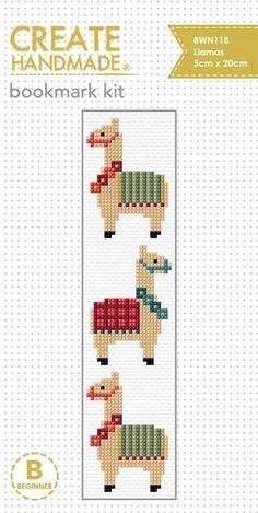 the bookmark kit is designed to look like two llamas in sweaters