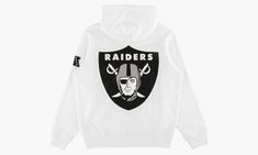 The Supreme Raiders ‘47 Hoodie is part of a collaborative assortment that launched with the Supreme Spring/Summer 2019 collection.  On the front of the cotton hooded sweatshirt is a Supreme logo across the chest.  A large Raiders logo flanks the back and an AFC logo appears on the left arm.  The hoodie is appropriately shaded in white, black, and silver Raiders colors.  With an overwhelming number of white hoodies on the market, this particular one should be a no-brainer for Raiders fans and any Raiders Logo, Supreme Logo, Raiders Fans, Stadium Goods, The Supreme, Summer 2019, Black And Silver, White Hoodie, Hooded Sweatshirt