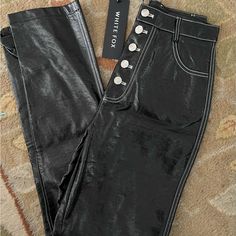 New With Tag Black Vegan Leather (Pu) High Waisted Button Front Pants From White Fox Boutique, Size S, Waist 26”, Hip 17” Across, Inseam 31” Edgy Bottoms With Button Closure For Fall, Edgy Black Bottoms With Button Closure, High Rise Bottoms With Button Closure For Night Out, High Rise Button Closure Night Out Bottoms, Fitted Bottoms With Button Zip Fly For Night Out, High Rise Button Closure Bottoms For Night Out, Chic Black Bottoms With Button Zip Fly, Black High-rise Bottoms With Button Zip Fly, Trendy Black Bottoms With Button Zip Fly